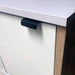 42mm matte black drawer latch on cabinet