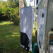 Shower spider side view while attached to camper